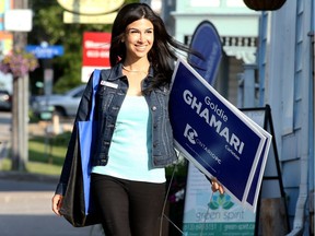 Goldie Ghamari was still busy with signs Thursday.