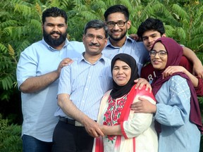 Originally from Pakistan, Shabana Baig (centre)  came to Ottawa 22 years ago with her husband, Tariq and two young children: Abdullah, now 23 (left) and Aiman, now 22 (right). The pair went on to have Hasan, 19 (rear, centre) and Ibrahim, 17 (rear right) here in Canada.