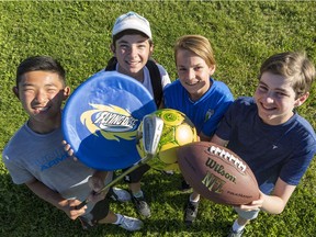 Teenagers (L-R) Jasper Li, Josh Lindsay, Nate Contant, and Matthew Robertson are developing an sports/play app. June 11, 2018.