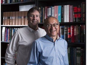 Barney Shum (R), a former employee at Library and Archives Canada, was acquitted Monday of two counts of "making opportunity" to "defraud the government". It's the culmination of nine years of investigation and litigation. Barney with one of his lawyers John Hale at John's law office. June 13, 2018. Errol McGihon/Postmedia