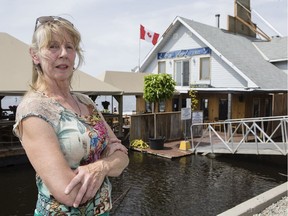 Shirley Kent is trying to complete her $1 million sale of the Rockcliffe Boathouse Marina but cannot obtain title to the access road and parking lot because of a dispute with the province and the National Capital Commission.June 26, 2018. Errol McGihon/Postmedia