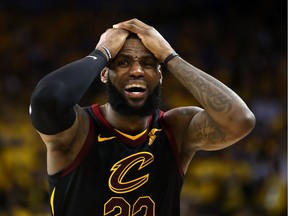 LeBron James of the Cavaliers reacts to a call during Game 1 of the NBA final against the Warriors in Oakland on Thursday night.