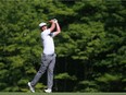 Bryson DeChambeau watches his second shot on the 15th hole during the third round of play on Saturday at Dublin, Ohio.