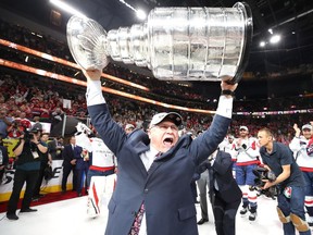 LAS VEGAS, NV - JUNE 07:  Head coach Barry Trotz of the Washington Capitals hoists the Stanley Cup after his team defeated the Vegas Golden Knights 4-3 in Game Five of the 2018 NHL Stanley Cup Final at T-Mobile Arena on June 7, 2018 in Las Vegas, Nevada.