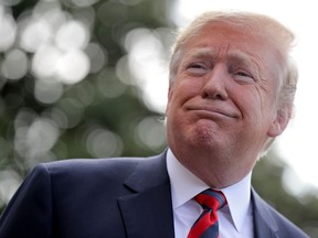 WASHINGTON, DC - JUNE 08:  U.S. President Donald Trump talks to reporters as he departs the White House June 8, 2018 in Washington, DC. Trump is traveling to Canada to attend the G7 summit before heading to Singapore on Saturday for a planned U.S.-North Korea summit.