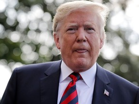 WASHINGTON, DC - JUNE 08:  U.S. President Donald Trump talks to reporters as he departs the White House June 8, 2018 in Washington, DC. Trump is traveling to Canada to attend the G7 summit before heading to Singapore on Saturday for a planned U.S.-North Korea summit.