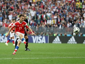 MOSCOW:  Aleksandr Golovin of Russia scores his side's fifth goal from a free kick during the 2018 FIFA World Cup Russia Group A match between Russia and Saudi Arabia at Luzhniki Stadium on June 14.