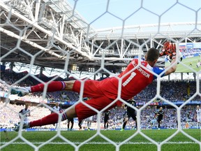 Hannes Halldorsson of Iceland saves a penalty kick by Lionel Messi of Argentina during the 2018 FIFA World Cup Russia Group D match at Moscow on Saturday.