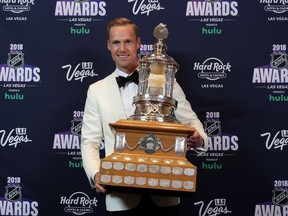 LAS VEGAS, NV - JUNE 20:  Pekka Rinne of the Nashville Predators poses with the Vezina Trophy given to the top goaltender in the press room at the 2018 NHL Awards presented by Hulu at the Hard Rock Hotel & Casino on June 20, 2018 in Las Vegas, Nevada.