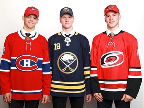 Jesperi Kotkaniemi, left, was selected third overall by the Montreal Canadiens, Rasmus Dahlin, middle, was selected first overall by the Buffalo Sabres and Andrei Svechnikov was selected second overall by the Carolina Hurricanes in Dallas on Friday evening.