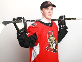 Jacob Bernard-Docker poses after being selected 26th overall by the Senators during the first round of the 2018 NHL Draft in Dallas on Friday night.