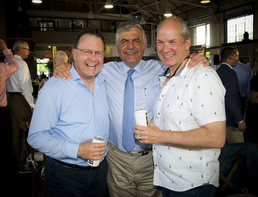 From left, Yves Laberge, vice-president and general manager of Star Motors, Honorary colonel Paul Hindo and Jeff Mierins, owner of Star Motors.