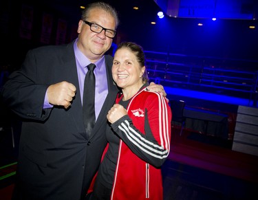 Angelo Tsarouchas, emcee for the event, and Jill Perry, Beaver Boxing Club head coach and president.