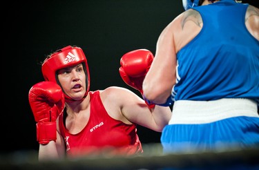Light heavyweight Marija "the Honey Badger" Curran (wearing red) of Ottawa's Beaver Boxing Club won her bout against Sabrina Holmström of Majornas Boxing Club in Gothenburg, Sweden.