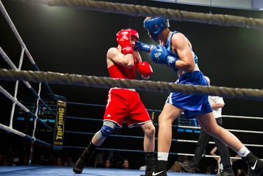 Welterweight Max Cartson of the Beaver Boxing Club (in red) won his bout against John Anders Jeppsson Rudell of Majornas Boxing Club in Gothenburg, Sweden.