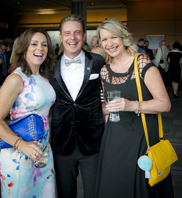 From left, Tammy Laverty Hall, ringside announcer Derick Fage with his wife, Monika Palitza-Fage.