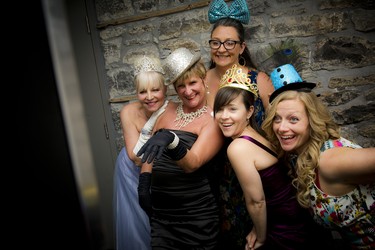 From left, Kathy Godding, Deborah Smith, Lee Bushey, Laura Lyons and Meredith Blogg, friends who gathered in the selfie booth for a photo shoot.