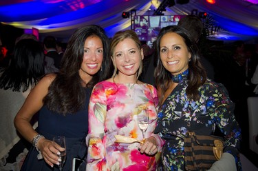 From left, Afrodity Aliferis, Cindy Tomlinson Keon, executive vice-president at R.W. Tomlinson Limited, and Nella Zourntos of RE/MAX Absolute Realty Inc.