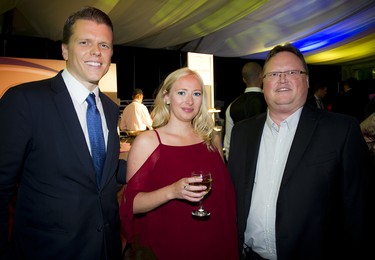 From left, Adam Powadiuk, director of commercial financing with First National Financial, mortgage agent Chelsey Philip, and Dean Drevniok. president of Frecon Construction Ltd.