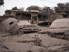 View of the damage casued by the eruption of the Fuego Volcano in San Miguel Los Lotes, a village in Escuintla Department, about 35 km southwest of Guatemala City, on June 4, 2018. At least 25 people were killed, according to the National Coordinator for Disaster Reduction (Conred), when Guatemala's Fuego volcano erupted Sunday, belching ash and rock and forcing the airport to close..