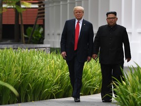 The leaders during a break in talks at their historic US-North Korea summit.