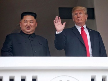 This handout photo taken on June 12, 2018 and released by The Straits Times shows North Korea's leader Kim Jong Un (L) and US President Donald Trump (R) together during a break in their talks at the historic US-North Korea summit, at the Capella Hotel on Sentosa island in Singapore. Donald Trump and Kim Jong Un became on June 12 the first sitting US and North Korean leaders to meet, shake hands and negotiate to end a decades-old nuclear stand-off.