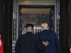 This handout photo taken on June 12, 2018 and released by The Straits Times shows US President Donald Trump (R) and North Korea's leader Kim Jong Un (L) leaving after a signing ceremony during their historic US-North Korea summit, at the Capella Hotel on Sentosa island in Singapore. Donald Trump and Kim Jong Un became on June 12 the first sitting US and North Korean leaders to meet, shake hands and negotiate to end a decades-old nuclear stand-off.