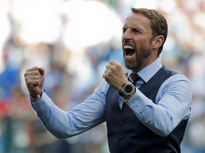 England head coach Gareth Southgate celebrates his team's 6-1 victory at the end of the group G match between England and Panama at the 2018 soccer World Cup at the Nizhny Novgorod Stadium in Nizhny Novgorod , Russia, Sunday, June 24, 2018.