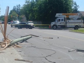 Crash site with downed hydro poles in Alta Vista.
