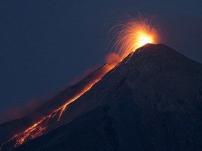 The Volcan de Fuego spews hot molten lava from its crater in Guatemala.