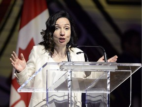 Bloc Quebecois Leader Martine Ouellet jokes during her speech at the Parliamentary Press Gallery Dinner at the Museum of History in Gatineau, Quebec on Saturday, May 26, 2018.