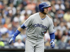 Toronto Blue Jays' Justin Smoak watches his two-run home run against the Detroit Tigers during the sixth inning of a baseball game Sunday, June 3, 2018, in Detroit.