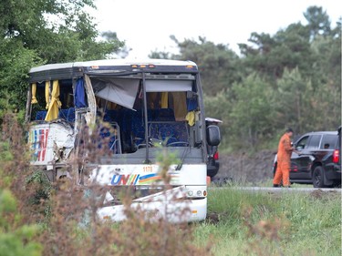 The bus involved in the crash on the 401 west of Prescott. Photo by Wayne Cuddington/ Postmedia