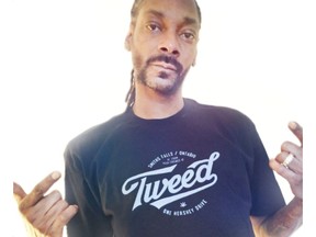 Snoop Dogg rocks a Tweed T-shirt.