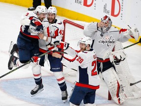 Members of the Washington Capitals celebrate as they defeat the Vegas Golden Knights in Game 5 of the NHL hockey Stanley Cup Finals to win the Stanley Cup on June 7, 2018
