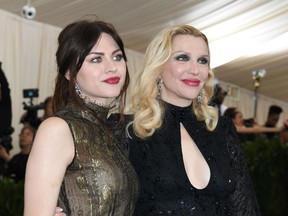 Frances Bean Cobain and Courtney Love arrive for the Costume Institute Benefit May 1, 2017 at the Metropolitan Museum of Art in New York. During the divorce proceedings, Miss Cobain had argued that the guitar should remain in her family, but Silva successfully claimed it was his, as Miss Cobain had given it to him as a gift.