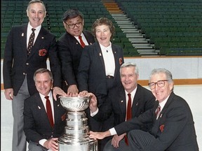 Harley Hotchkiss, Calgary businessman who was part of the group that brought the Flames to the city, died Wednesday at age 83. The owners of the Calgary Flames after their team's triumphant Cup win in 1989. Pictured from left to right: Byron ÒBJÓ Seaman ,Daryl  ÒDocÓ Seaman, Norman Kwong, Sonia Scurfield, Harley Hotchkiss, Norman Green.. photo courtesy of Calgary Flames Wednesday June 22, 2011.