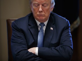President Donald Trump listens during a meeting with Republican lawmakers in the Cabinet Room of the White House, Tuesday, June 26, 2018, in Washington.