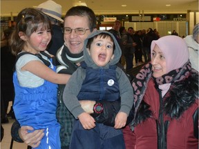 Hassan Diab greets his family at the Ottawa airport earlier this year upon his release from a French prison.