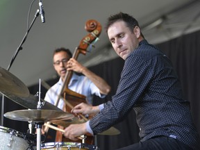 Montreal drummer and bandleader Jim Doxas, fight, wibh bassist Adrian Vedady, at the 2018 TD Ottawa jazz Festival.