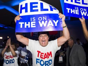 A supporter reacts after the Ontario PC's reached a majority at the Doug Ford election night headquarters in Toronto on June 7, 2018.