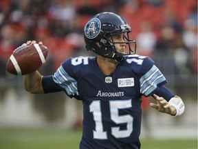 Argonauts quarterback Ricky Ray prepares to make a throw during the first half of Saturday's game against the Stampeders in Toronto. He was injured late in the third quarter.