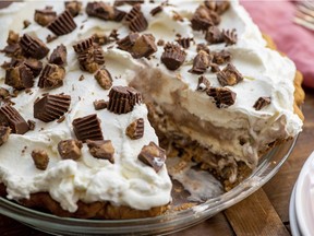 This May 2018 photo shows a chocolate peanut butter cup ice cream pie. This desert is from a recipe by Katie Workman.