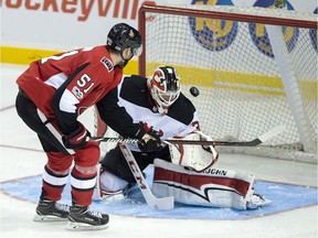 Logan Brown of the Senators is foiled by Cory Schneider of the Devils in the 2017 Kraft Hockeyville NHL pre-season game at Summerside, P.E.I.