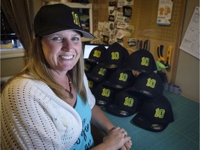 Susan Bissonnette, owner of The Stitching Bees, who volunteered to make Ryan Straschnitzki hats as part of a fund raising campaign for the injured Humboldt Broncos player and the extra care he will need once released from hospital, works on hats at her home in Airdrie, Alta., on, June 7, 2018.