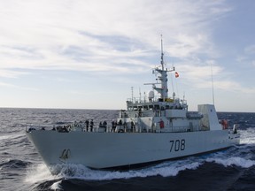 HMCS Moncton begins its approach during a replenishment at sea exercise with HMCS Summerside on January 31, 2016, as the ships prepare for Operation CARIBBE. Photo: Lt(N) Blake Patterson, RCN.
