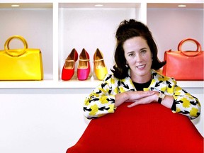 FILE - In this May 13, 2004 file photo, designer Kate Spade poses with handbags and shoes from her next collection in New York. Law enforcement officials say Tuesday, June 5, 2018, that New York fashion designer Kate Spade has been found dead in her apartment in an apparent suicide.