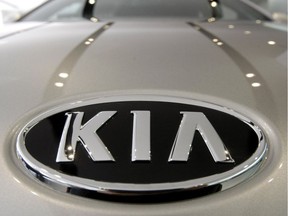 FILE - In this Jan. 28, 2011 file photo, KIA Motors logo is seen on a K7 sedan at a showroom in Seoul, South Korea.  Kia is recalling over a half-million vehicles in the U.S. because the air bags may not work in a crash. The recall apparently is related to federal investigation into air bag failures in Kia and partner Hyundai vehicles that were linked to four deaths. Vehicles covered by the recall include 2010 through 2013 Forte compact cars and 2011 through 2013 Optima midsize cars. Also covered are Optima Hybrid and Sedona minivans from 2011 and 2012.(AP Photo/Ahn Young-joon, File) ORG XMIT: NY113
