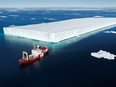 The Canada C3 vessel, the Polar Prince, sails alongside an enormous tabular ice berg, the size of a city block, that had broken free from the Greenland ice shelf. The drone shots of the ship against the stark Arctic wilderness are among the most beautiful scenes in the C3 Imax film showing this summer at the Canadian Museum of History.   (handout)