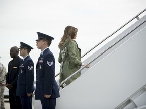 First lady Melania Trump boards a plane at Andrews Air Force Base, Md., Thursday, June 21, 2018, to travel to Texas to visit the U.S.-Mexico border.